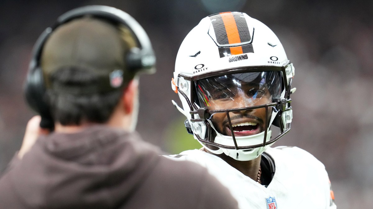 Cleveland Browns quarterback Shedeur Sanders (12) talks to head coach Kevin Stefanski in the first half against the Las Vegas Raiders at Allegiant Stadium.