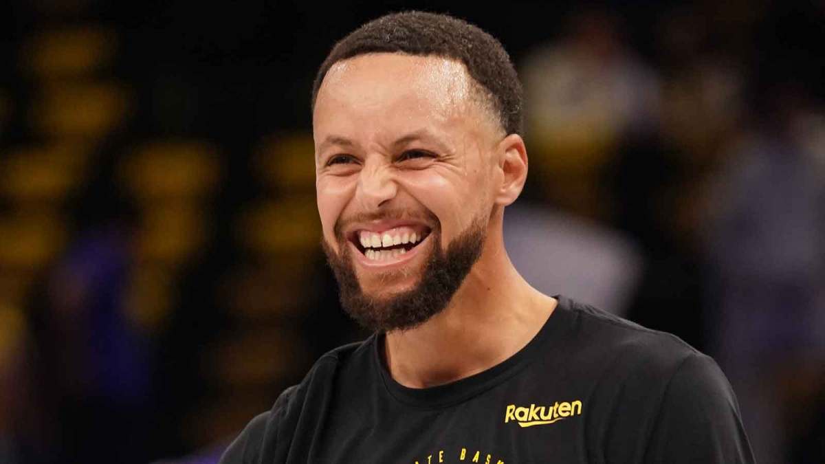 Golden State Warriors guard Stephen Curry (30) laughs during warm ups before the game against the Houston Rockets at Chase Center.