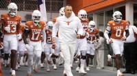 Texas Longhorns head coach Steve Sarkisian leads his team on to the field before a game against the Vanderbilt Commodores at Darrell K Royal-Texas Memorial Stadium.
