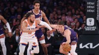 Suns guard Collin Gillespie (12) steals from Knicks' Jalen Brunson