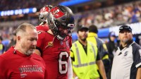 Tampa Bay Buccaneers quarterback Baker Mayfield (6) walks off the field at halftime with an apparent injury against the Los Angeles Rams at SoFi Stadium.