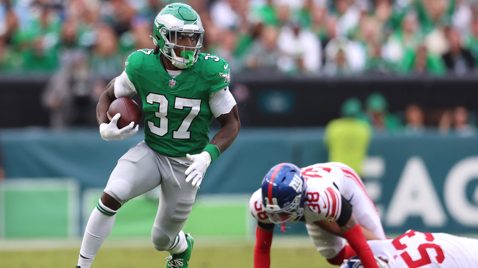 Philadelphia Eagles running back Tank Bigsby (37) runs against the New York Giants during the fourth quarter at Lincoln Financial Field.
