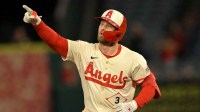 Los Angeles Angels left fielder Taylor Ward (3) rounds the bases after hitting a solo home run in the third inning against the Kansas City Royals at Angel Stadium.