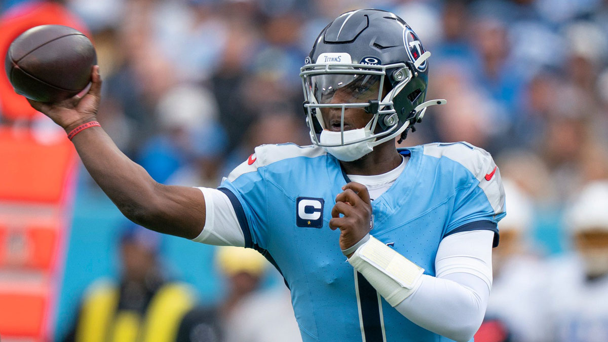 Tennessee Titans quarterback Cam Ward (1) throws against the Los Angeles Chargers during their game at Nissan Stadium