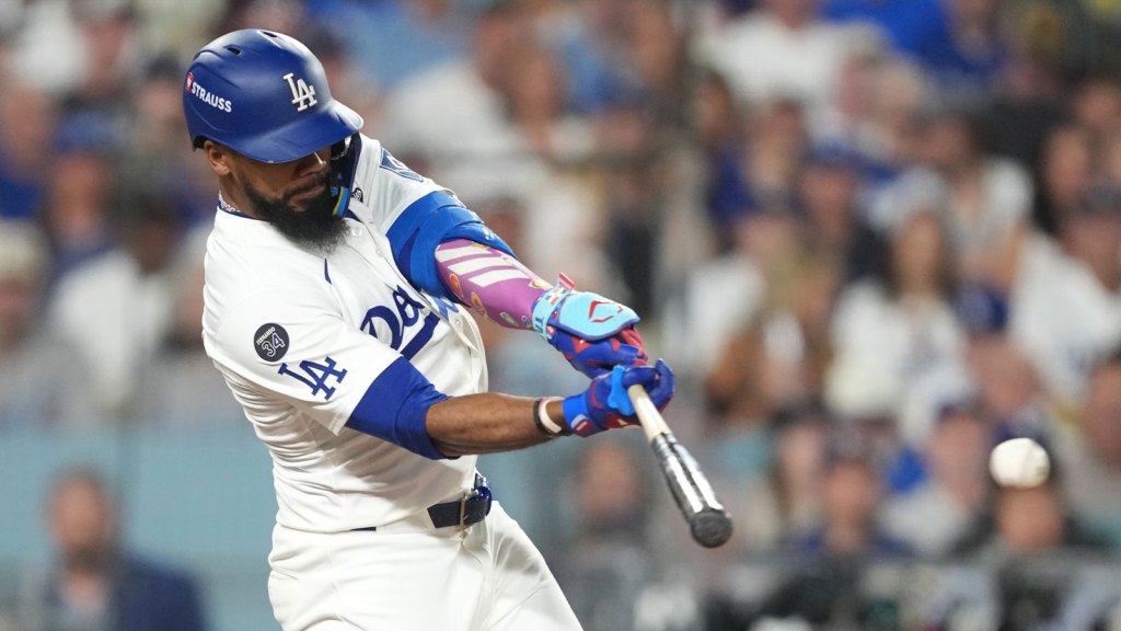 Los Angeles Dodgers right fielder Teoscar Hernandez (37) hits a single against the Toronto Blue Jays in the sixth inning during game four of the 2025 MLB World Series.