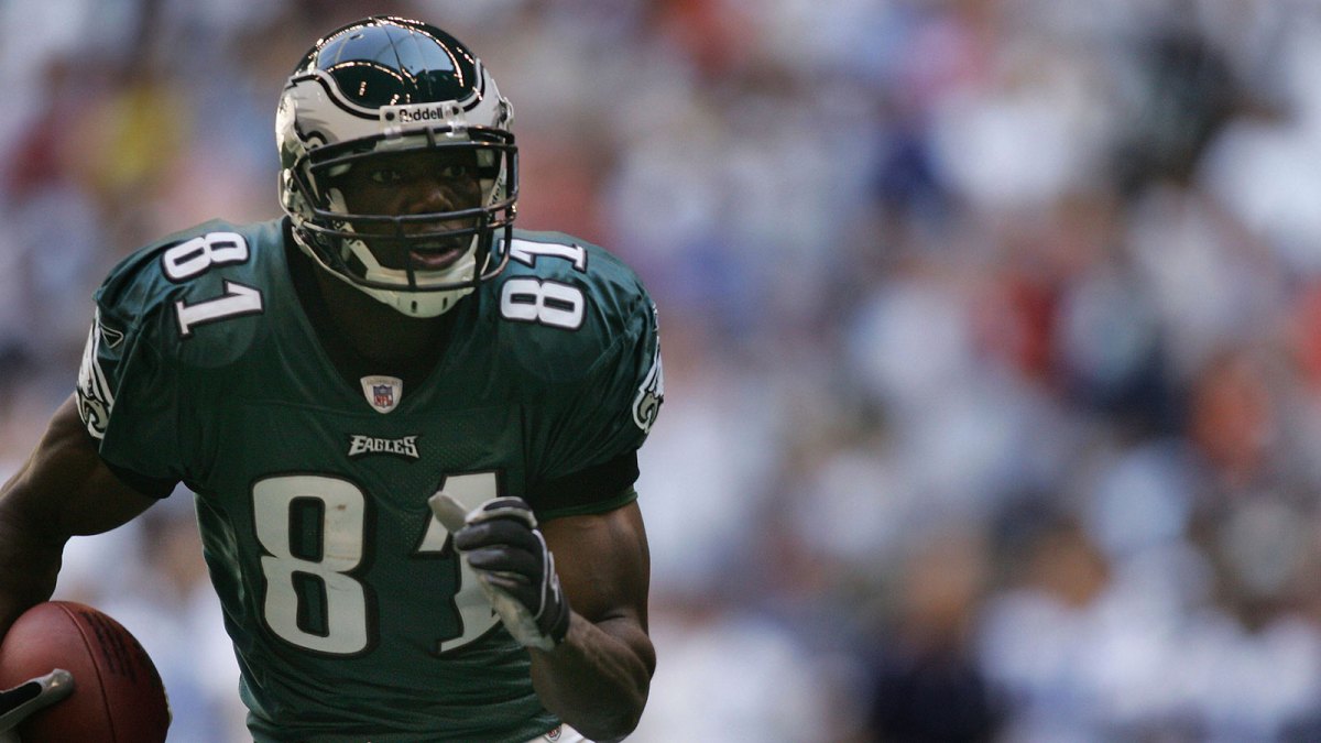 Irving,TX USA; Philadelphia Eagles wide receiver Terrell Owens #81 runs after catching a pass during the 1st quarter against the Dallas Cowboys at Texas Stadium.