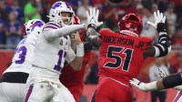 Buffalo Bills quarterback Josh Allen (17) throws a pass against Houston Texans defensive end Will Anderson Jr. (51) in the first quarter at NRG Stadium.