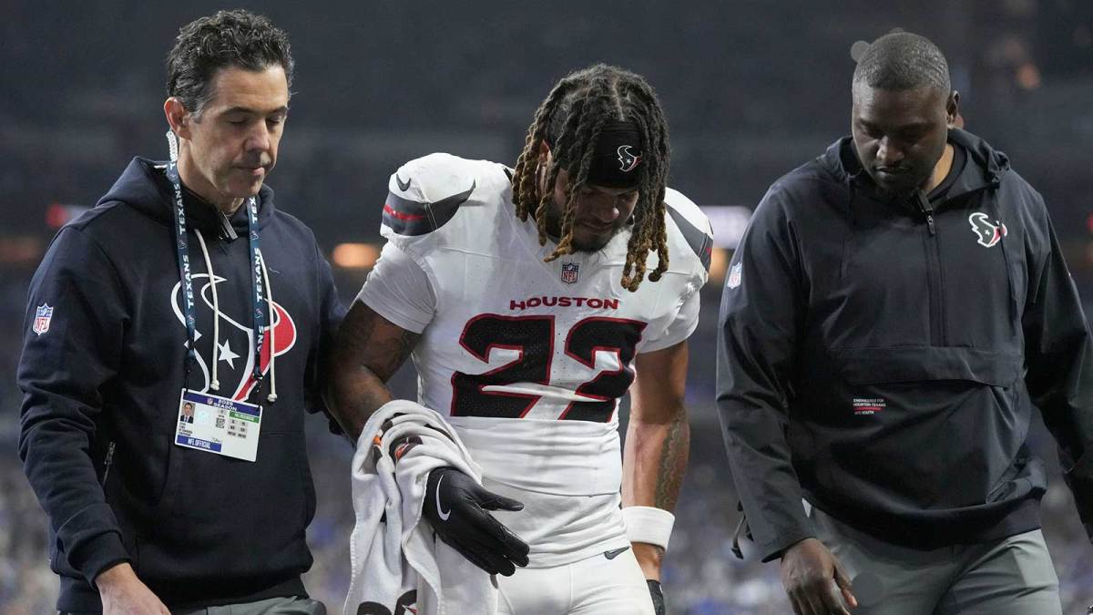 Houston Texans safety Jaylen Reed (23) is helped off the field following an injury Sunday, Nov. 30, 2025, during a game against the Indianapolis Colts at Lucas Oil Stadium in Indianapolis.