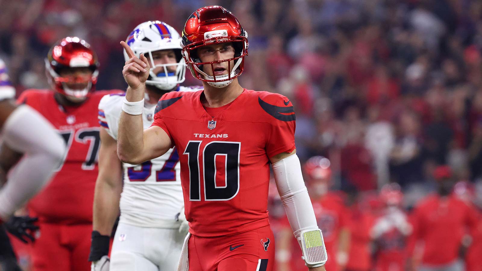 Houston Texans quarterback Davis Mills (10) celebrates after a touchdown against the Buffalo Bills in the second quarter at NRG Stadium.