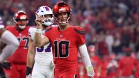Houston Texans quarterback Davis Mills (10) celebrates after a touchdown against the Buffalo Bills in the second quarter at NRG Stadium.