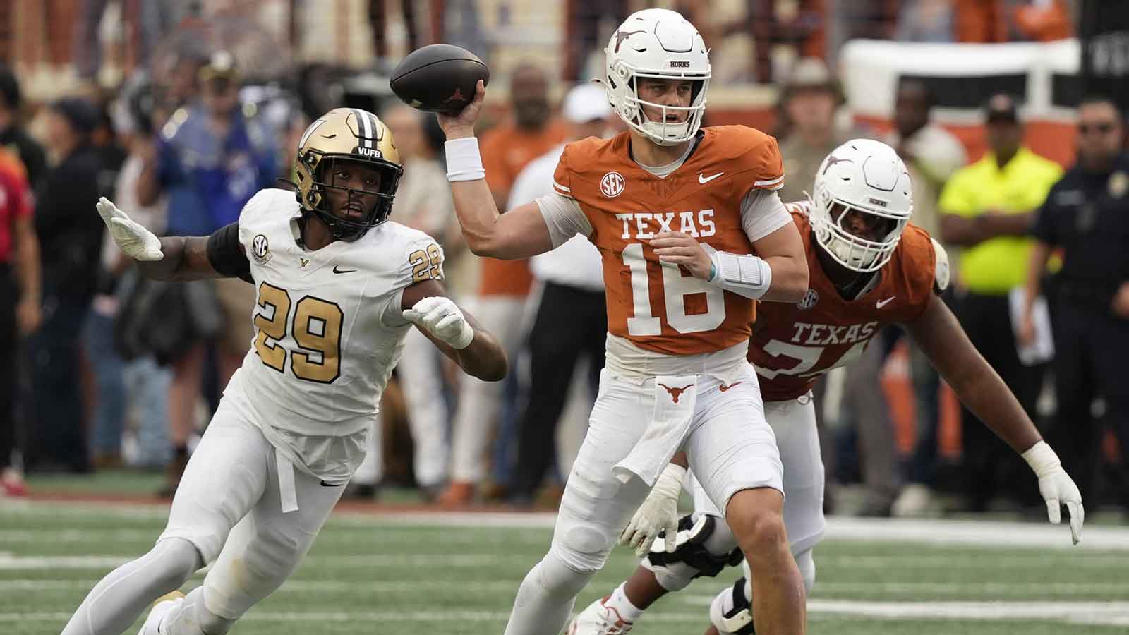 Texas Longhorns quarterback Arch Manning (16) passes ahead of Vanderbilt Commodores defensive back Thomas Jones (9) during the second half at Darrell K Royal-Texas Memorial Stadium