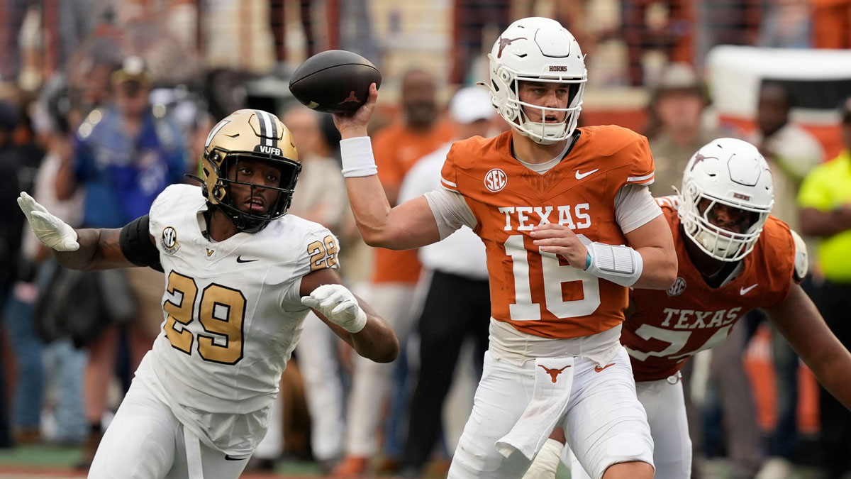 Texas Longhorns quarterback Arch Manning (16) passes ahead of Vanderbilt Commodores defensive back Thomas Jones (9) during the second half at Darrell K Royal-Texas Memorial Stadium.