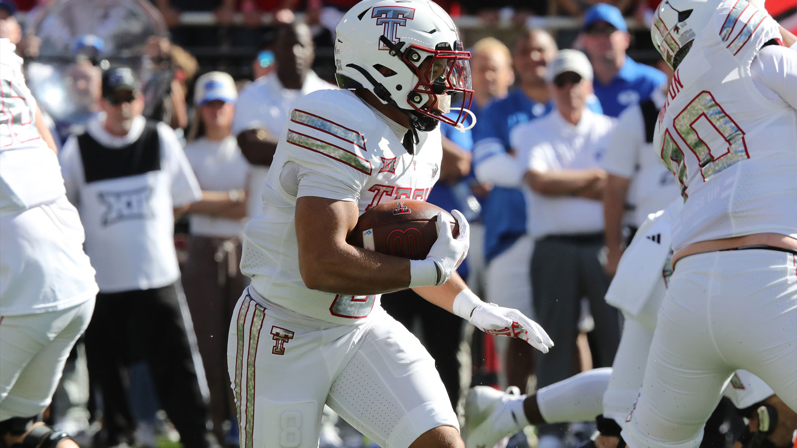 Texas Tech Red Raiders running back Cameron Dickey (8) rushes against the Brigham Young Cougars in the first half at Jones AT&T Stadium. 