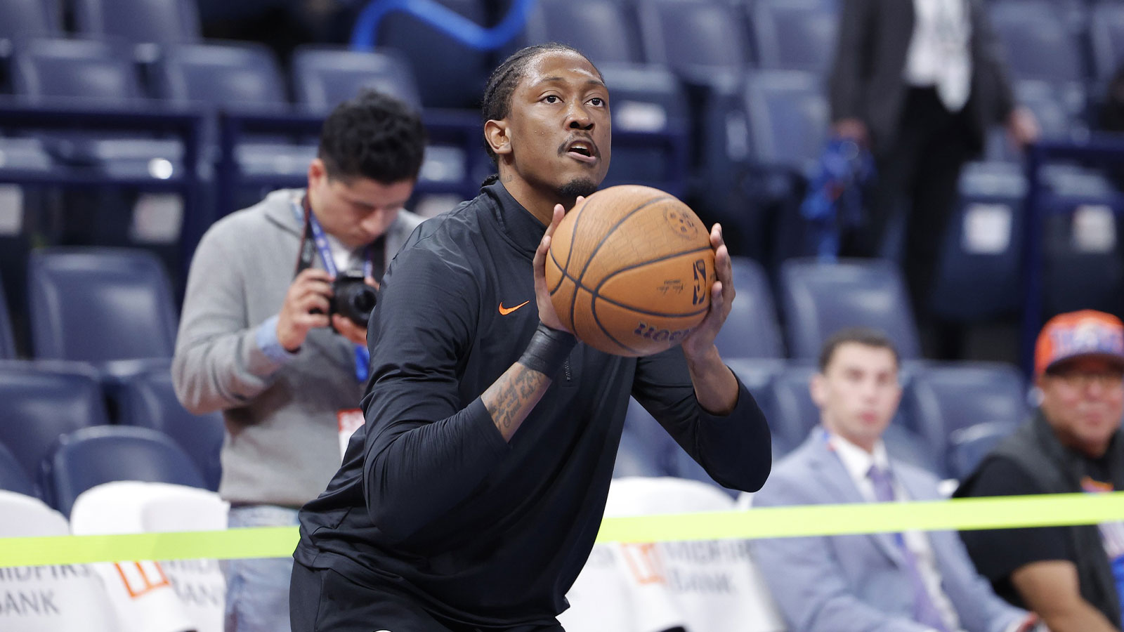 Thunder guard Jalen Williams warms up before the start of a game against the Phoenix Suns at Paycom Center