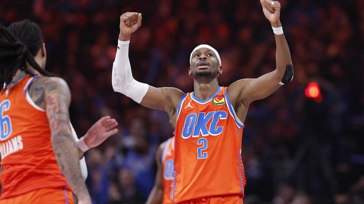 Thunder guard Shai Gilgeous-Alexander (2) celebrates after scoring against the Minnesota Timberwolves during the second half at Paycom Center with Michael Jordan in the background