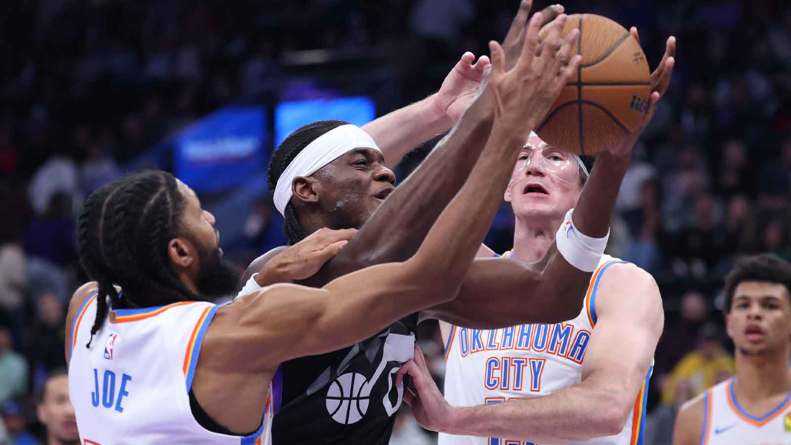 Thunder guard Isaiah Joe (11) and center Branden Carlson (15) during the second half at Delta Center