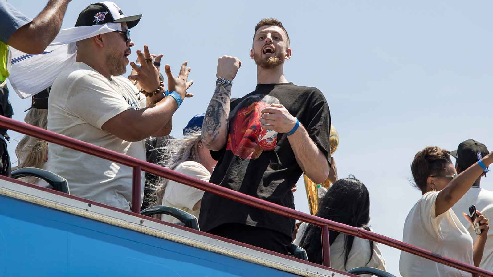 Thunder player Isaiah Hartenstein yells at fans during the 2025 NBA Oklahoma City Thunder championship parade