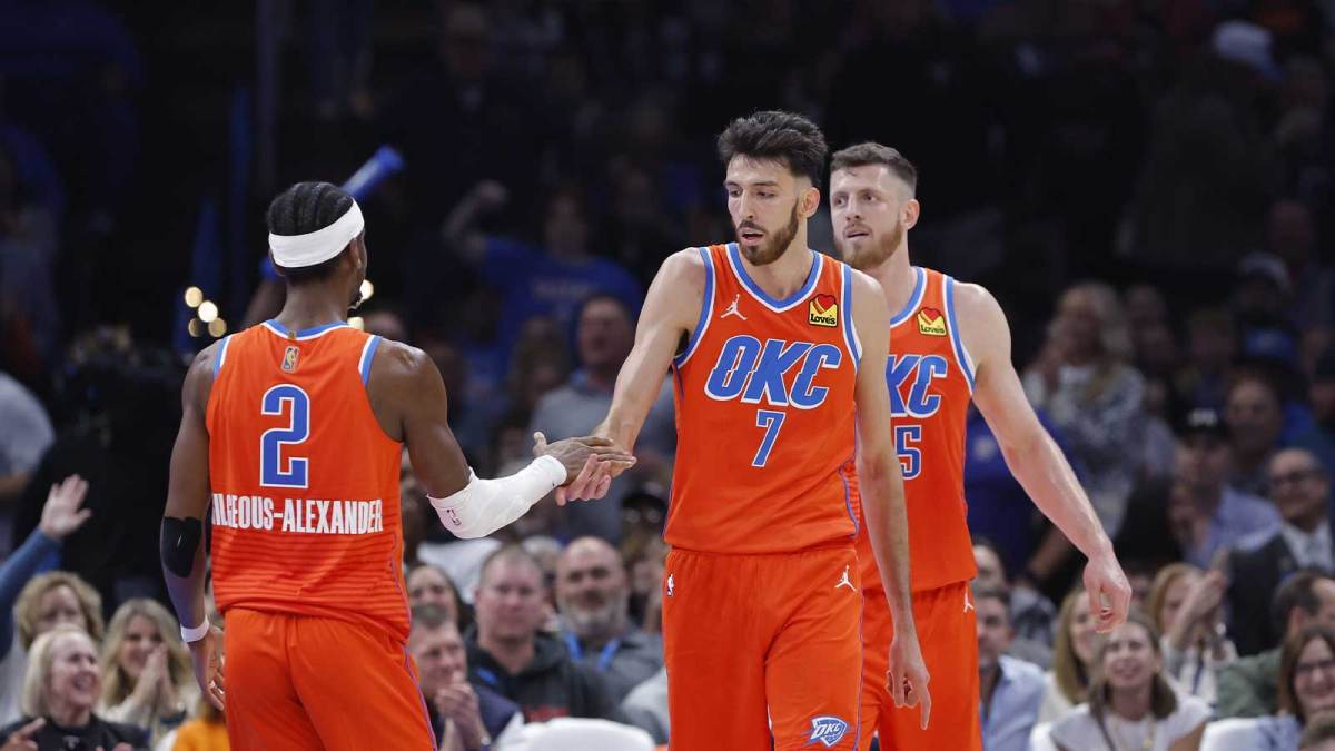 Thunder center Chet Holmgren (7) and Oklahoma City Thunder guard Shai Gilgeous-Alexander (2) celebrate after scoring against the Golden State Warriors during the second half at Paycom Center