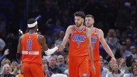 Thunder center Chet Holmgren (7) and Oklahoma City Thunder guard Shai Gilgeous-Alexander (2) celebrate after scoring against the Golden State Warriors during the second half at Paycom Center
