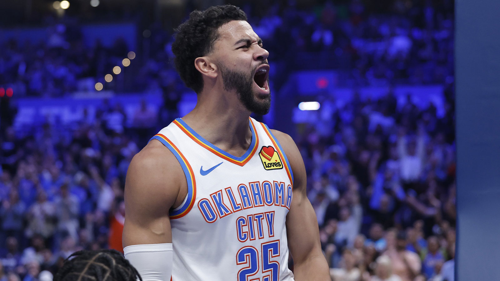Thunder guard Ajay Mitchell (25) celebrates after scoring against the Sacramento Kings during the second half at Paycom Center