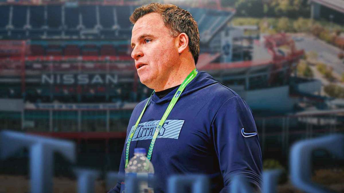 Titans GM Mike Borgonzi, Nissan Stadium behind him