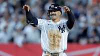 New York Yankees center fielder Trent Grisham (12) celebrates his double against the Boston Red Sox during the seventh inning of game two of the Wildcard round of the 2025 MLB playoffs at Yankee Stadium.