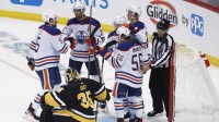 The Edmonton Oilers celebrate a goal by right wing Kailer Yamamoto (56) against the Pittsburgh Penguins goaltender Tristan Jarry (35) during the second period at PPG Paints Arena.