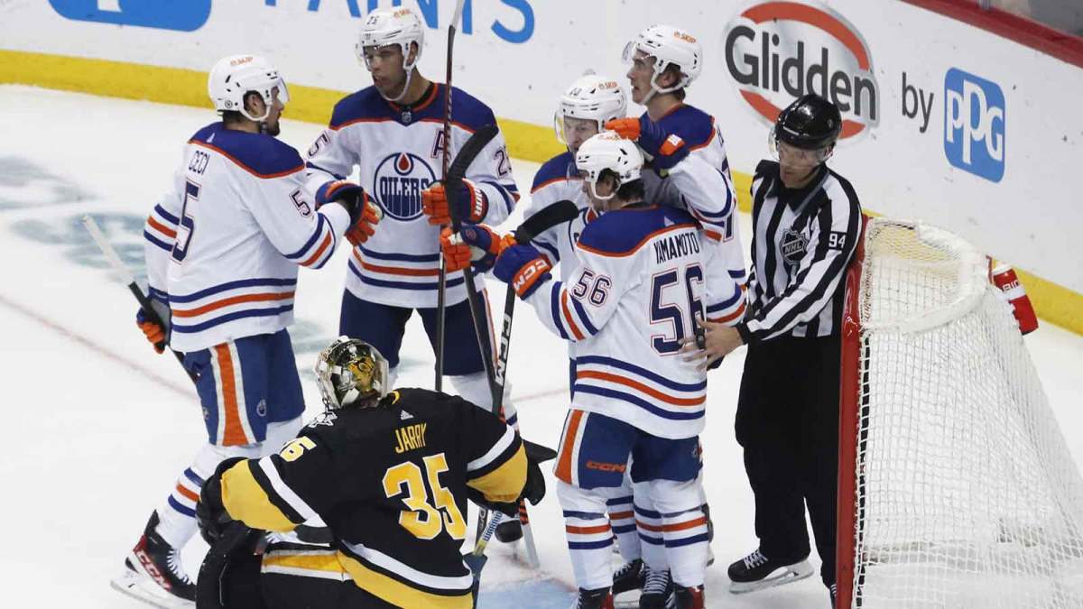 The Edmonton Oilers celebrate a goal by right wing Kailer Yamamoto (56) against the Pittsburgh Penguins goaltender Tristan Jarry (35) during the second period at PPG Paints Arena.