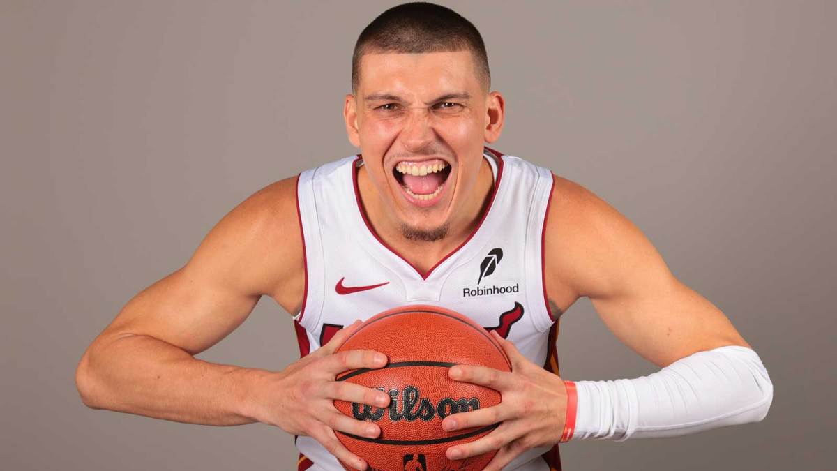Miami Heat guard Tyler Herro (14) poses for a photo during media day at Kaseya Center.