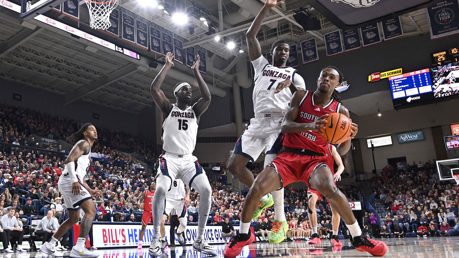 Southern Utah Thunderbirds forward Jalen Lee (9) drives the baseline against Gonzaga Bulldogs guard Tyon Grant-Foster (7) in the first half at McCarthey Athletic Center.