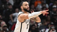 Brooklyn Nets forward Tyrese Martin (13) reacts after making a three point basket against the Toronto Raptors in the second half at Scotiabank Arena.