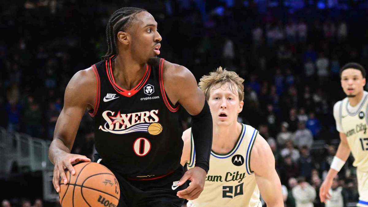 Philadelphia 76ers guard Tyrese Maxey (0) looks for a shot against Milwaukee Bucks guard AJ Green (20) in the first overtime at Fiserv Forum.