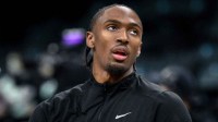 Philadelphia 76ers guard Tyrese Maxey (0) warms up before a game against the Brooklyn Nets at Barclays Center.