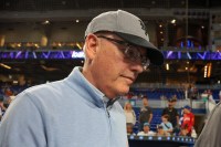 New York Mets owner Steve Cohen walks on the field before the game between the New York Mets and the Miami Marlins at loanDepot Park.