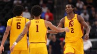 Southern California Trojans forward Ezra Ausar (2) is greeted by forward Jacob Cofie (6) and guard Rodney Rice (1) during the second half of the Hall of Fame Series game against the Illinois State Redbirds at Intuit Dome.