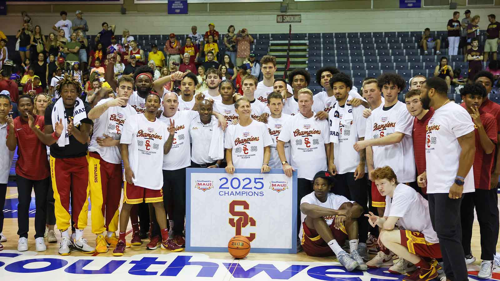 USC Trojans take a team photo after they defeated the Arizona State Sun Devils in the championship match at Lahaina Civic Center.