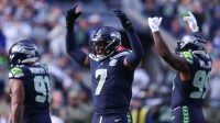 Seattle Seahawks linebacker Uchenna Nwosu (7) celebrates a defensive stop during the first quarter against the Arizona Cardinals at Lumen Field.