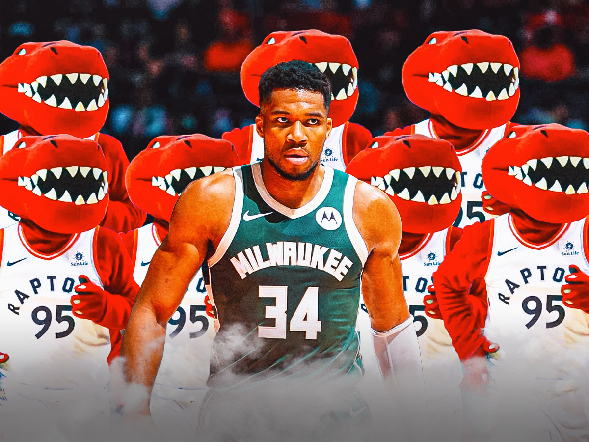 Bucks' Giannis Antetokounmpo surrounded by Raptors mascots