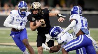 Vanderbilt quarterback Diego Pavia (2) runs the ball against Kentucky during the first half at FirstBank Stadium in Nashville, Tenn., Saturday, Nov. 22, 2025.