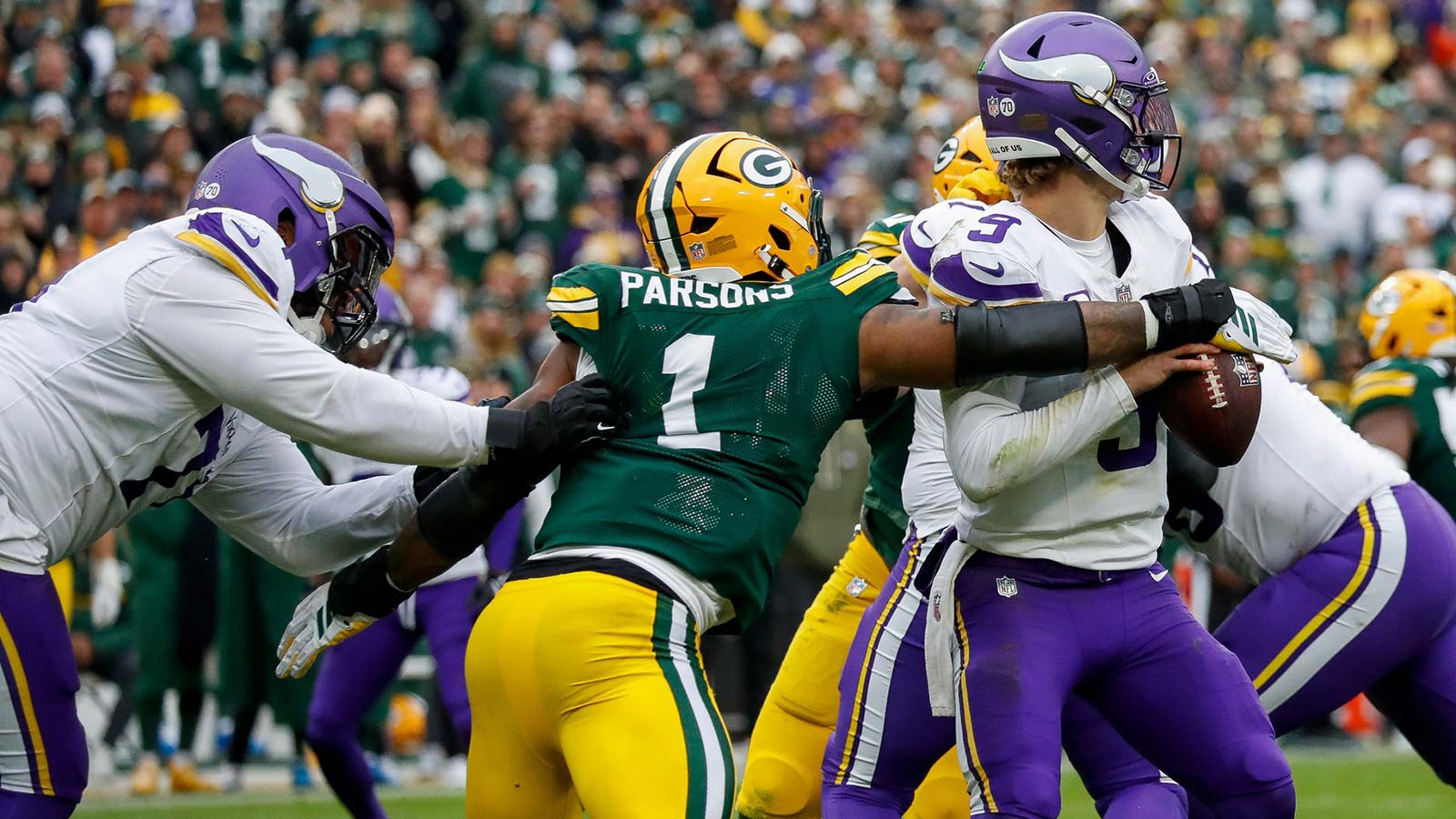 Green Bay Packers defensive end Micah Parsons (1) sacks Minnesota Vikings quarterback J.J. McCarthy (9) on Sunday, November 23, 2025, at Lambeau Field in Green Bay, Wis. The Packers won the game, 23-6.