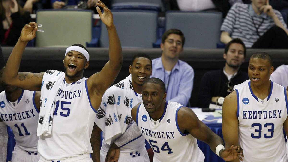 Kentucky Wildcats guard John Wall (11) and forward DeMarcus Cousins (15) and forward Patrick Patterson (54) and forward Daniel Orton (33) react from the bench near the end of the game against the East Tennessee Buccaneers in the first round of the 2010 NCAA mens basketball tournament at the New Orleans Arena. Kentucky won 100-71.