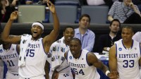 Kentucky Wildcats guard John Wall (11) and forward DeMarcus Cousins (15) and forward Patrick Patterson (54) and forward Daniel Orton (33) react from the bench near the end of the game against the East Tennessee Buccaneers in the first round of the 2010 NCAA mens basketball tournament at the New Orleans Arena. Kentucky won 100-71.