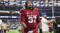 Arizona Cardinals defensive tackle Walter Nolen III (97) walks off the field after the game between the Dallas Cowboys and the Arizona Cardinals at AT&T Stadium.