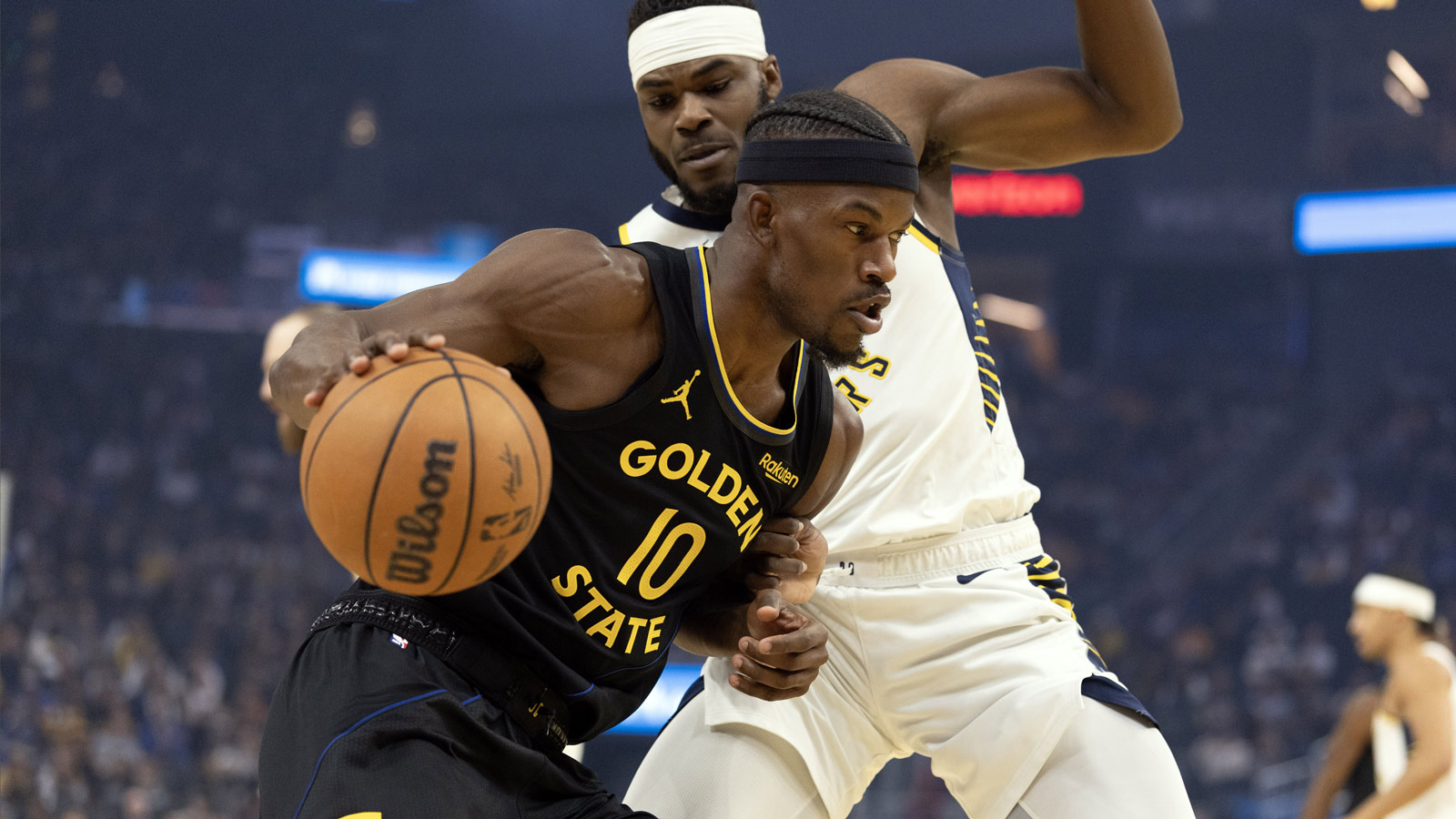 Warriors forward Jimmy Butler III (10) drives past Indiana Pacers forward Jarace Walker (5) during the first quarter at Chase Center