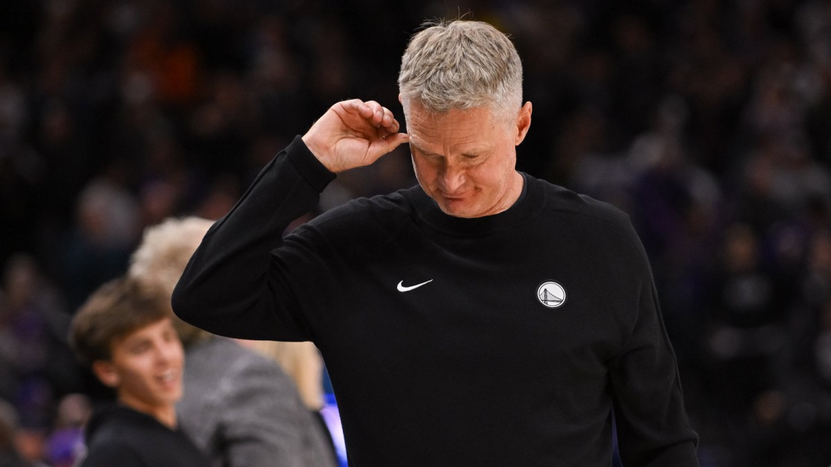 Warriors Head Coach Steve Kerr reacts to the final score of the game against the Sacramento Kings at Golden 1 Center with the Pacers logo in the background
