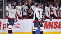 Washington Capitals forward Alex Ovechkin (8) celebrates with teammates after scoring a goal against the Montreal Canadiens during the third period at the Bell Centre.