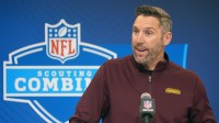 Washington Commanders general manager Adam Peters speaks during the NFL Scouting Combine at the Indiana Convention Center.