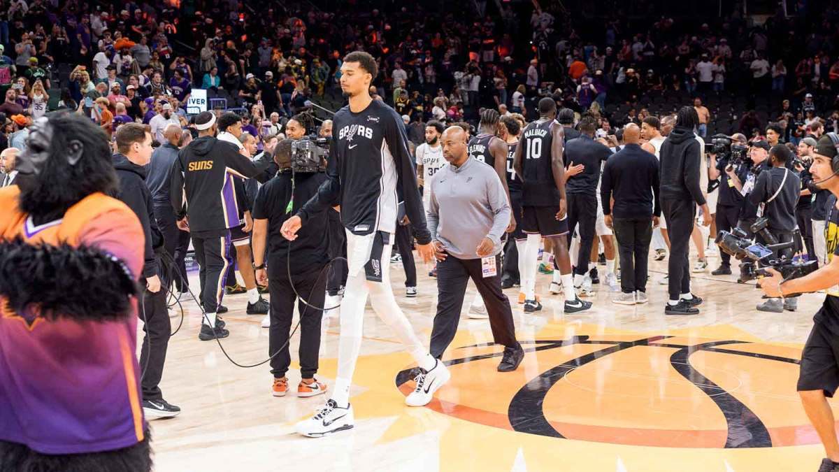 San Antonio Spurs forward Victor Wembanyama (1) leaves the court after a loss to the Phoenix Suns at Mortgage Matchup Center.
