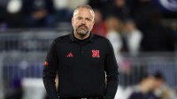 Nebraska Cornhuskers head coach Matt Rhule stands on the field during a warmup prior to the game against the Penn State Nittany Lions at Beaver Stadium.
