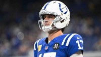 Indianapolis Colts quarterback Daniel Jones (17) looks on before the game against the Tennessee Titans at Lucas Oil Stadium.